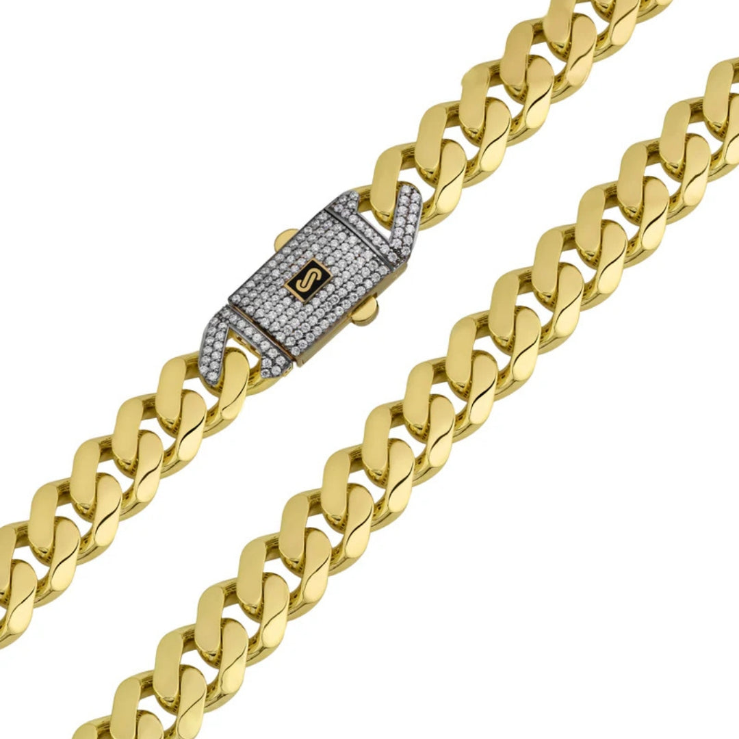Original Monaco gold chain layered with a pendant on male model, mid-length drape and bright Miami-style finish