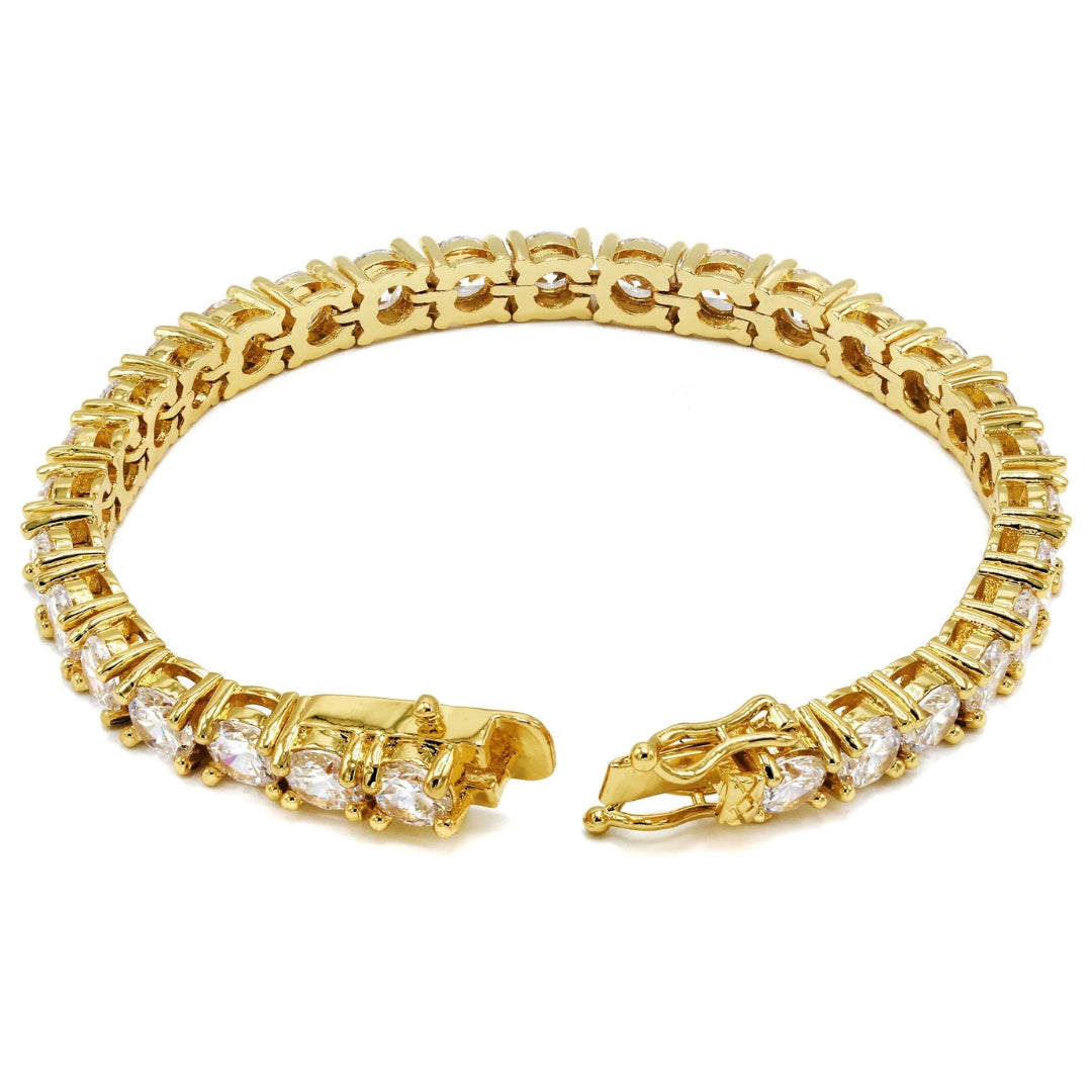 Alt text: “Yellow gold TAHI Jewelry Inc tennis bracelet with continuous prong-set stones and classic shine.”